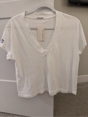 perfectwhitetee White V-Neck Short Sleeve Tee with Blue Heart Accent